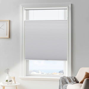 Gray top-down bottom-up cellular honeycomb shade: in a furnished room