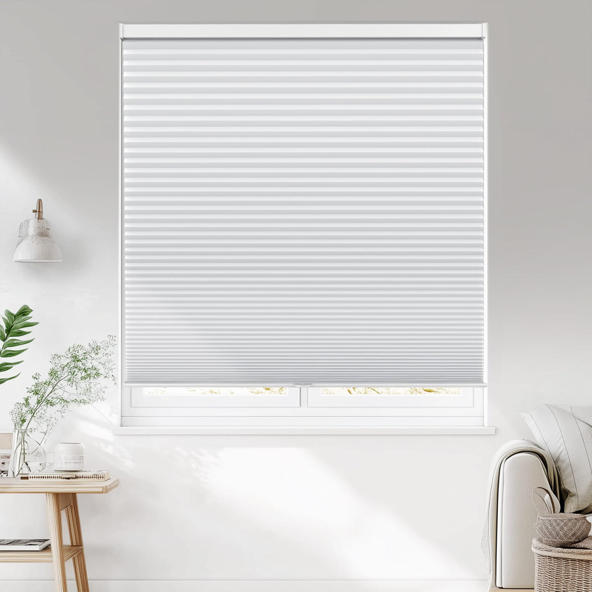 White cellular honeycomb shade: on a window