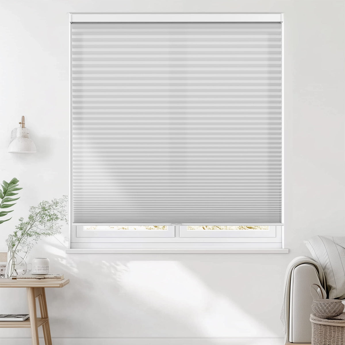 Gray cellular honeycomb shade: on a window