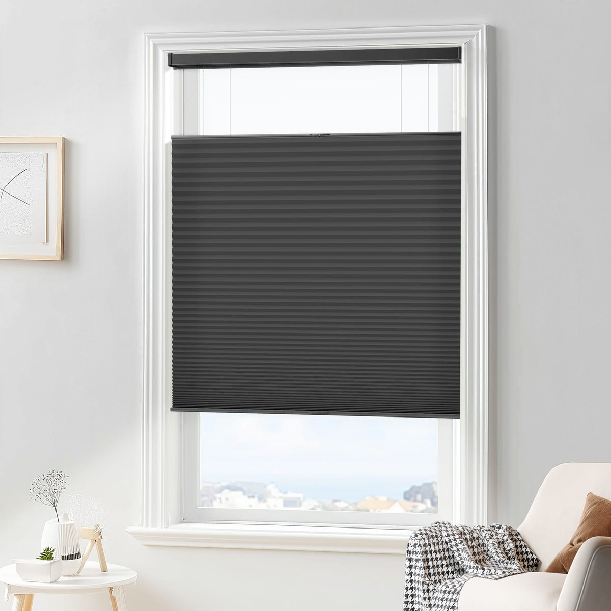 Black top-down bottom-up cellular honeycomb shade: in a furnished room