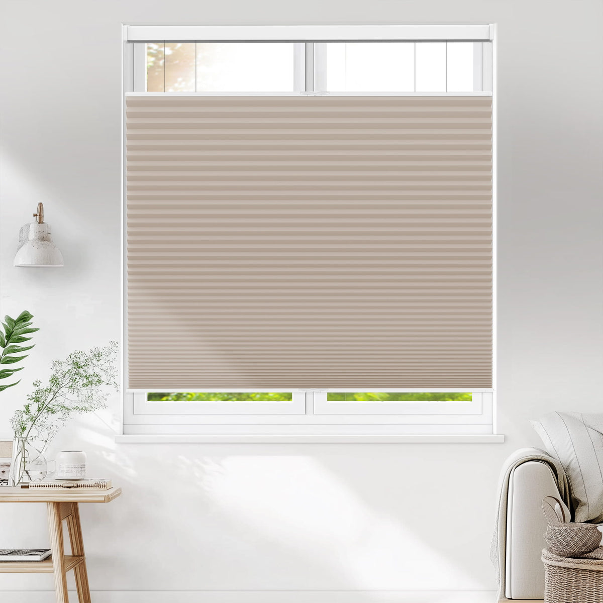 Taupe top-down bottom-up cellular honeycomb shade: on a window