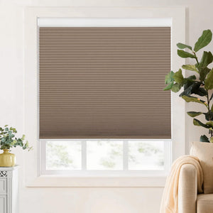 Brown cellular honeycomb shade: on a window