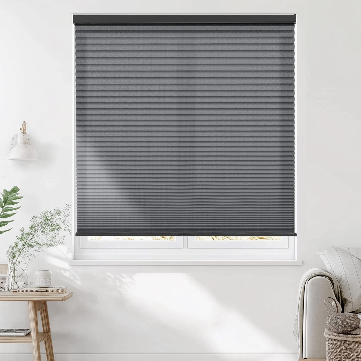 Dark gray cellular honeycomb shade: on a window