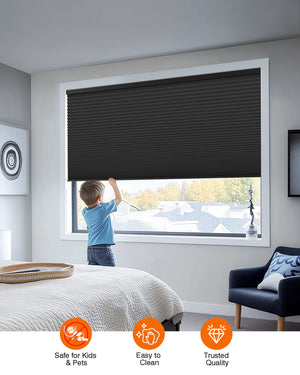 Black cellular honeycomb shade: cordless lift operation