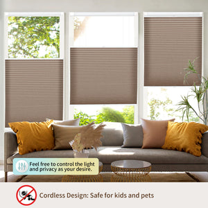 Brown top-down bottom-up no-drill cellular honeycomb shade: above a window seat
