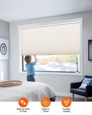 Cream cellular honeycomb shade: cordless lift operation