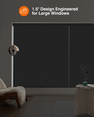 Black cellular honeycomb shade: in a furnished room