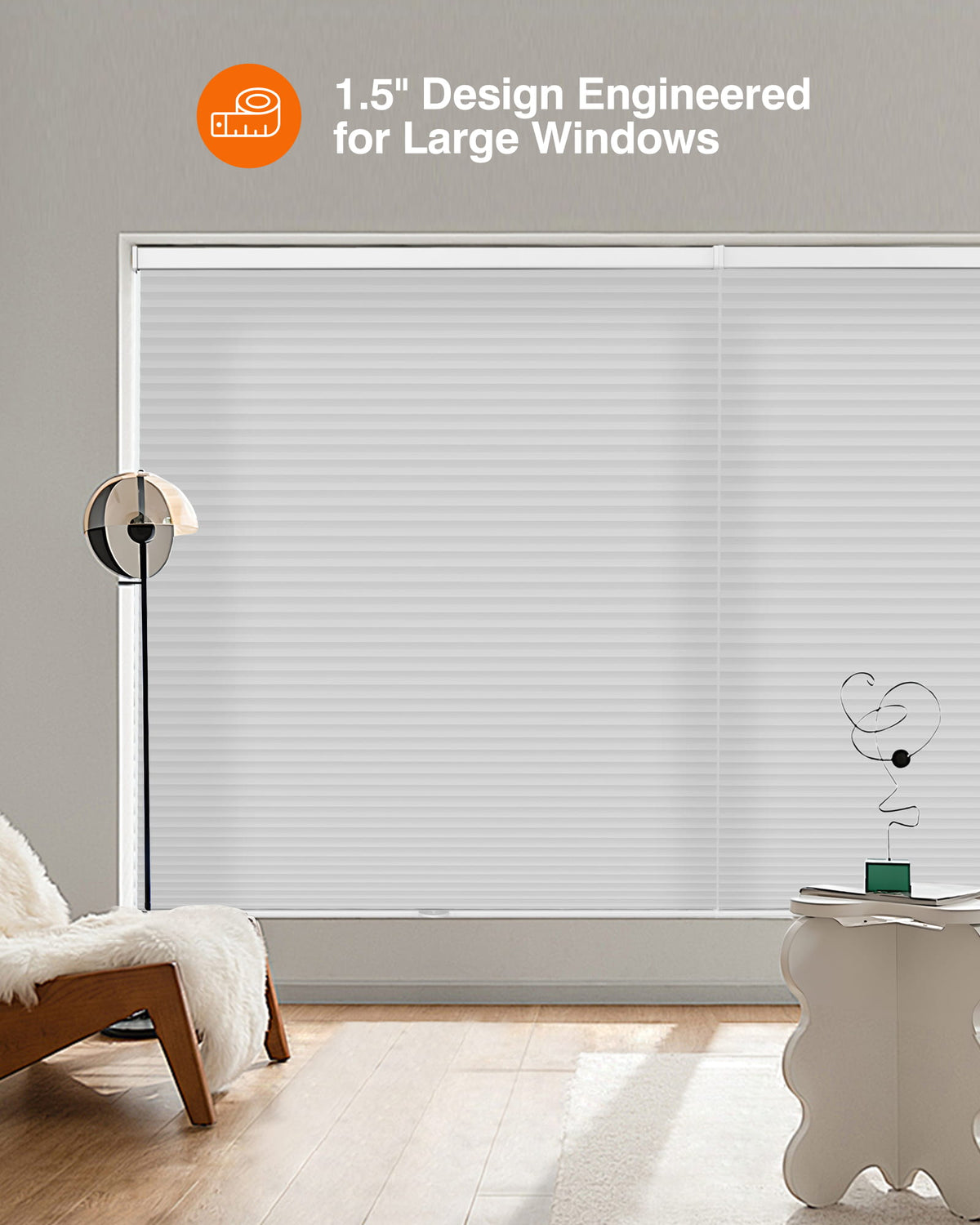 Gray cellular honeycomb shade: in a furnished room
