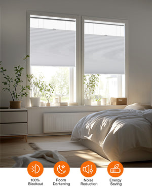 White top-down bottom-up cellular honeycomb shade: in a furnished room