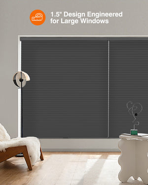 Black cellular honeycomb shade: in a furnished room