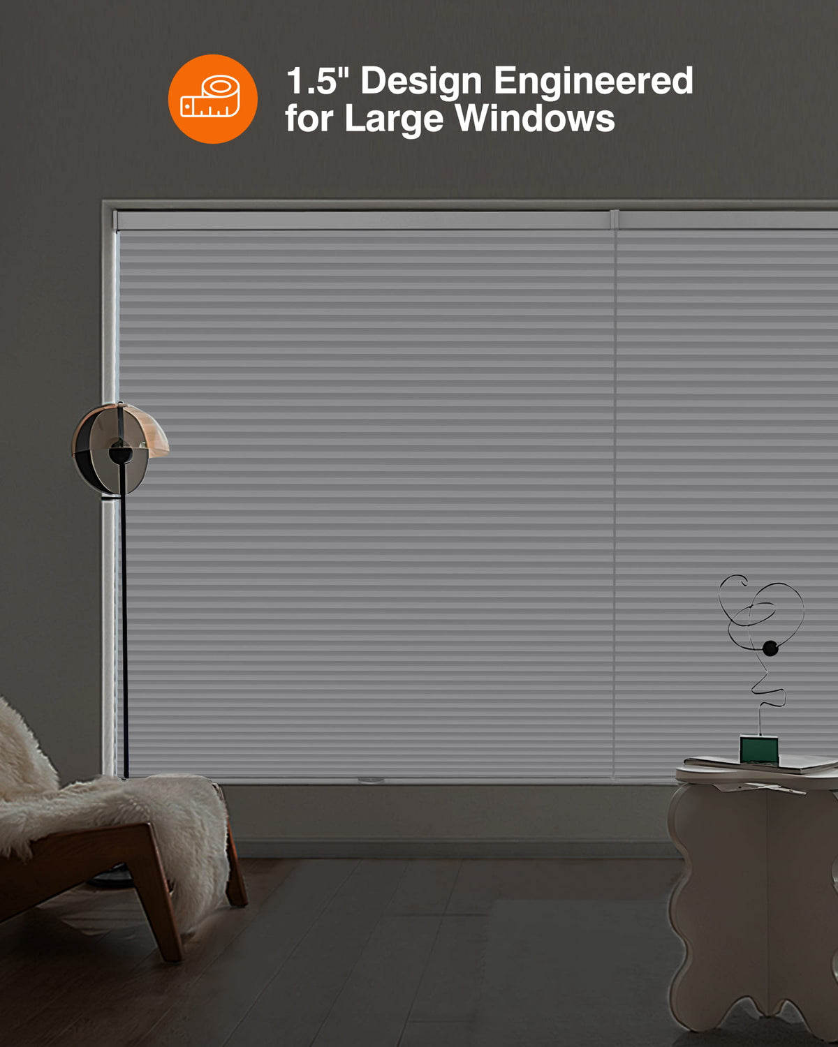 Gray cellular honeycomb shade: in a furnished room