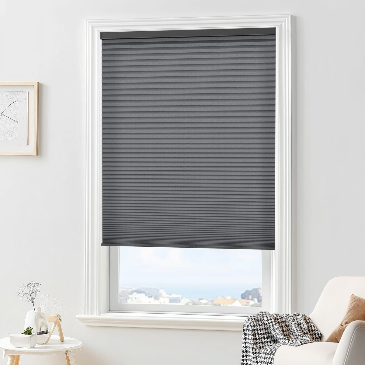 Dark gray cellular honeycomb shade: in a furnished room