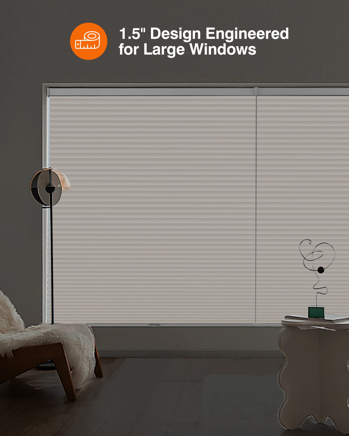 Cream cellular honeycomb shade: in a furnished room