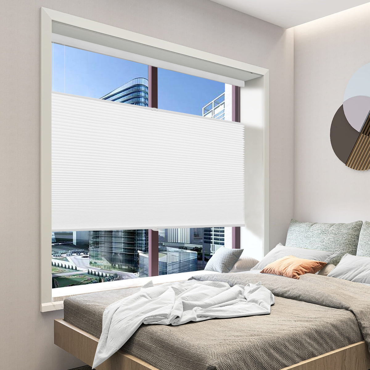 White top-down bottom-up cellular honeycomb shade: in a bedroom