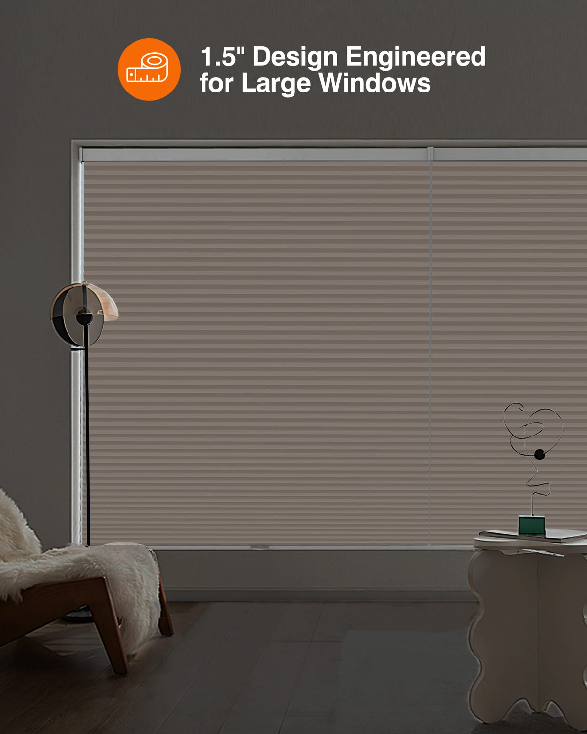 Taupe cellular honeycomb shade: in a furnished room
