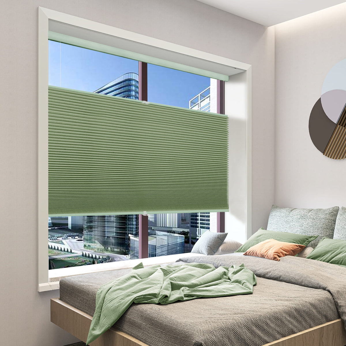 Green top-down bottom-up cellular honeycomb shade: in a bedroom