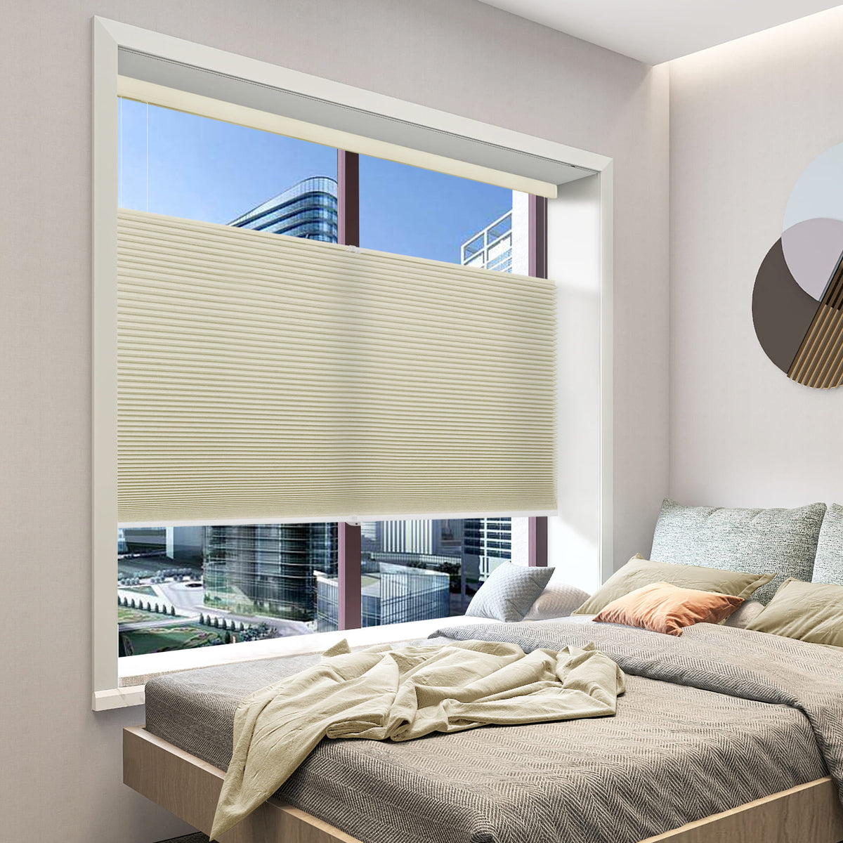 Beige top-down bottom-up cellular honeycomb shade: in a bedroom