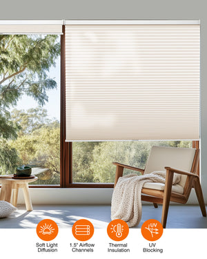 Cream cellular honeycomb shade: in a furnished room