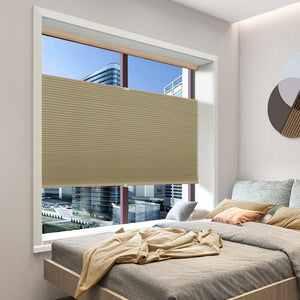 Brown top-down bottom-up cellular honeycomb shade: in a bedroom