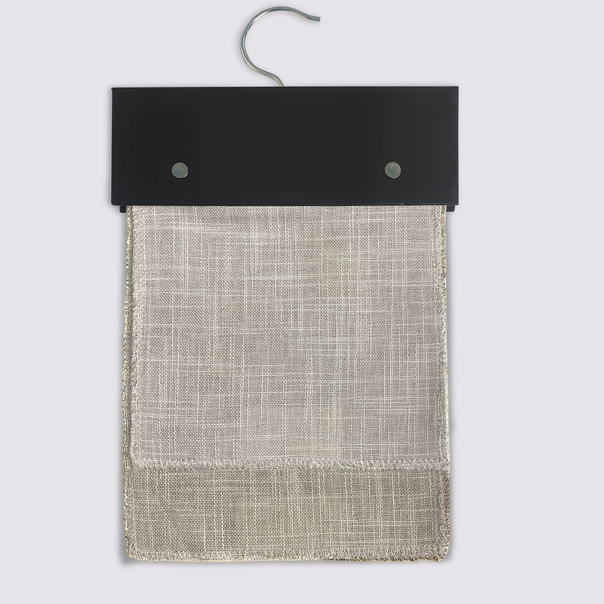 TM series Roman shade fabric swatches on a sample hanger