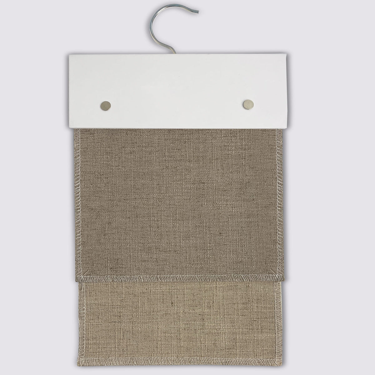 NM series Roman shade fabric swatches on a sample hanger
