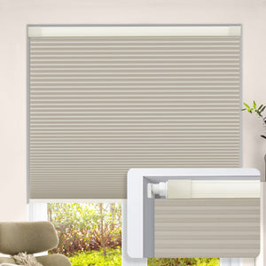 Beige no-drill cellular honeycomb shade: on a window
