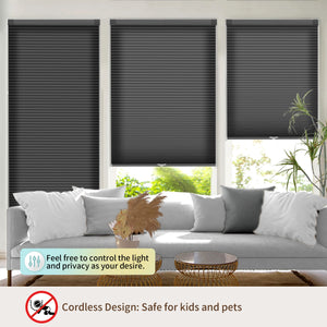 Black no-drill cellular honeycomb shade: above a window seat