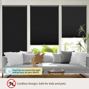 Black no-drill cellular honeycomb shade: above a window seat