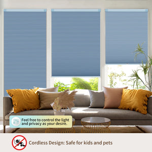 Blue no-drill cellular honeycomb shade: above a window seat