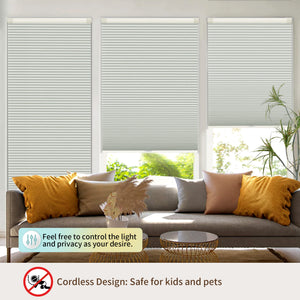 Off-white no-drill cellular honeycomb shade: above a window seat