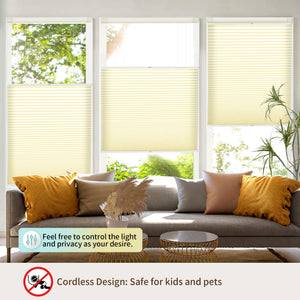 Yellow top-down bottom-up no-drill cellular honeycomb shade: above a window seat