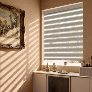 Tan no-drill zebra blind: in a furnished room
