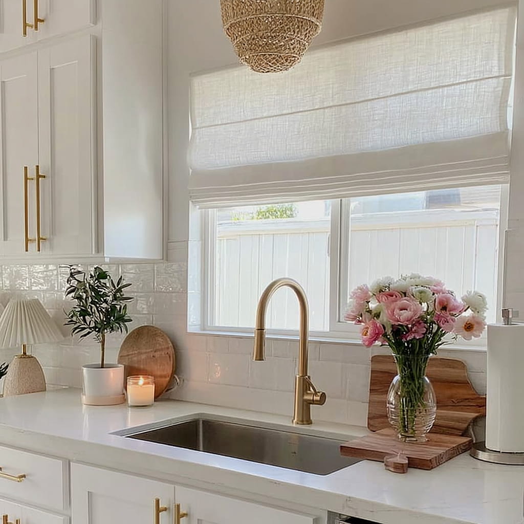 Light Roman shade above a kitchen sink