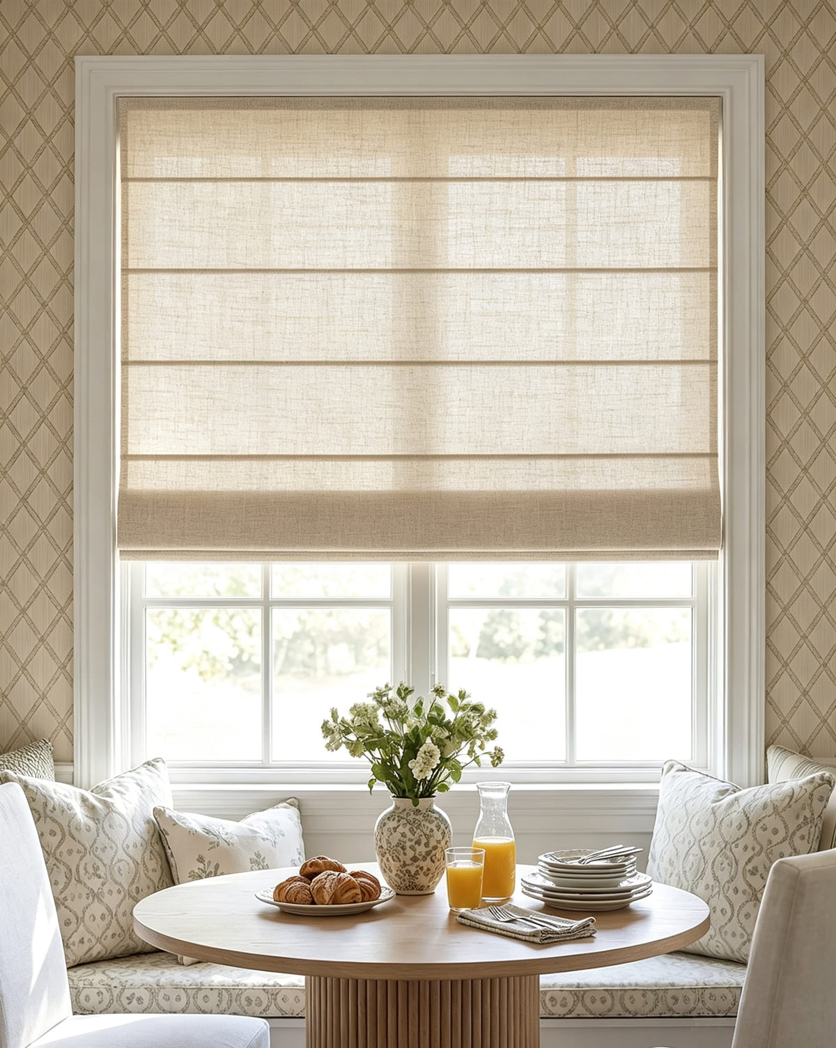 Beige Roman shade above a small dining table