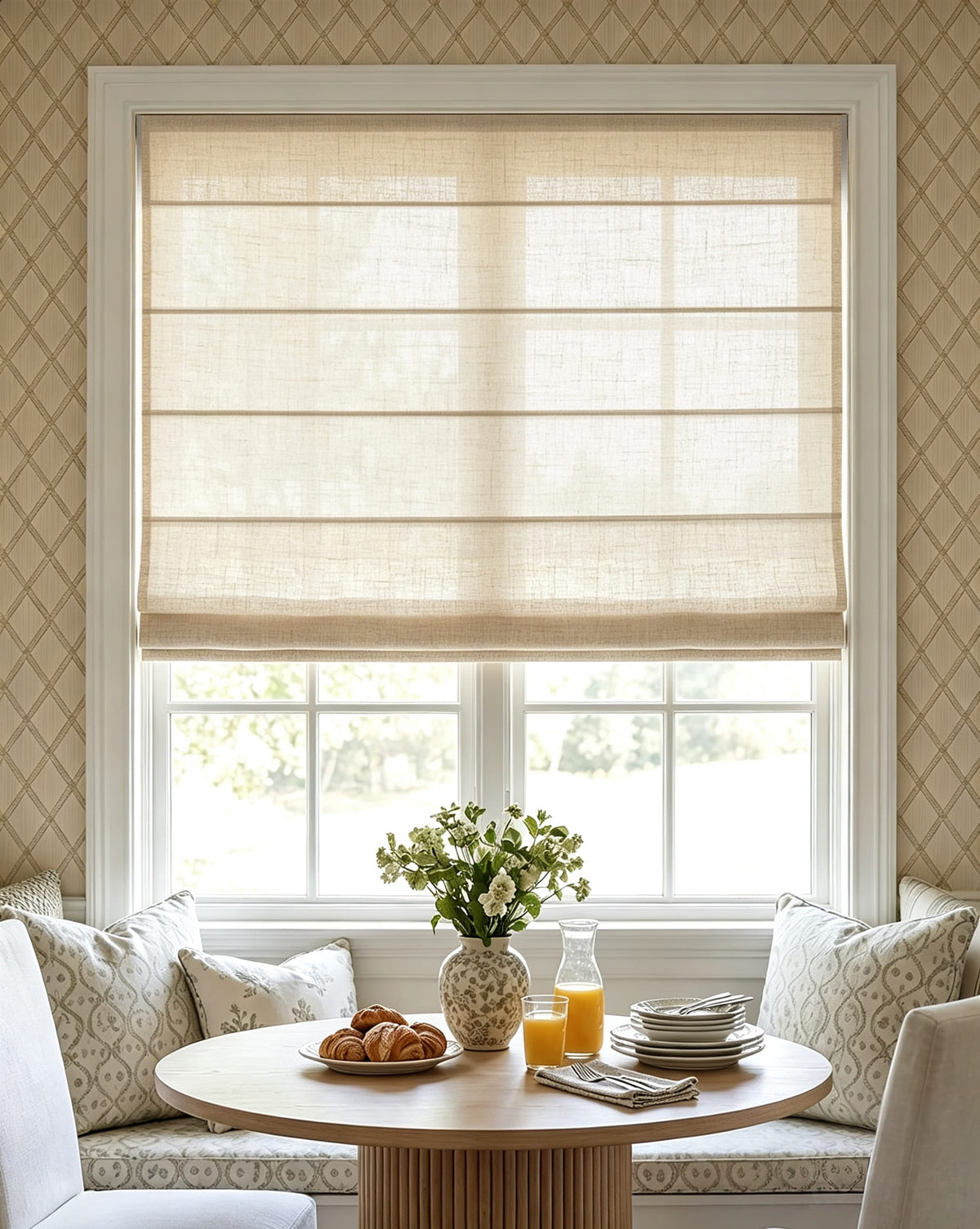 Beige Roman shade above a small dining table